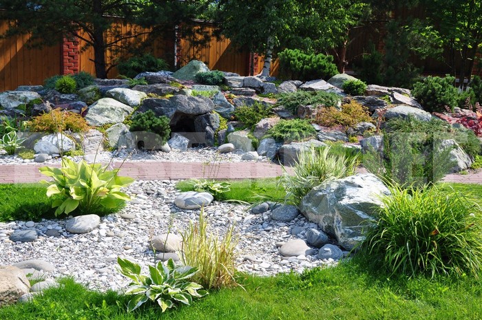 Landscaping of a site with a rock garden